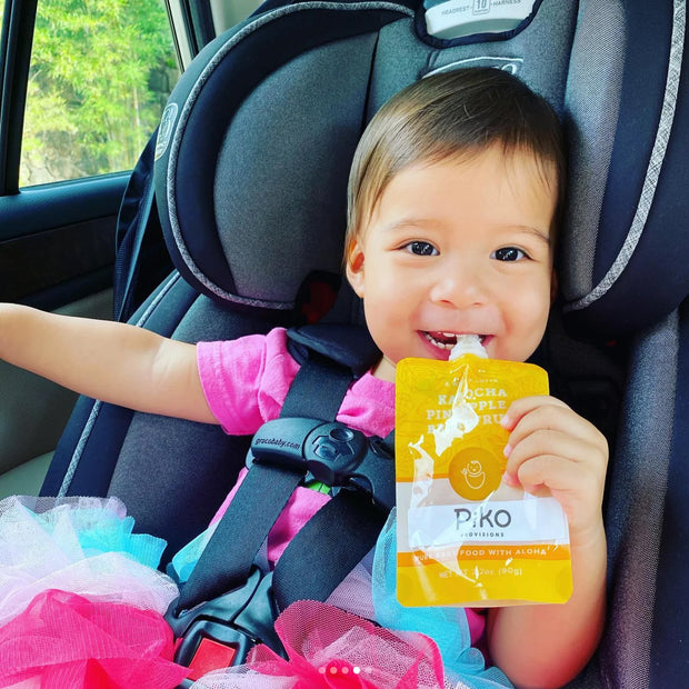 Baby in car seat with Piko pouch